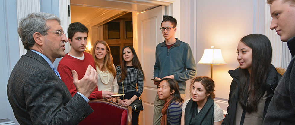President Salovey speaking with a group of students